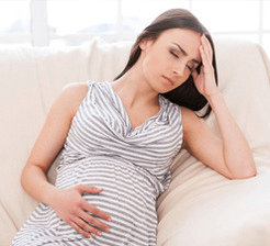 Woman struggling with morning sickness