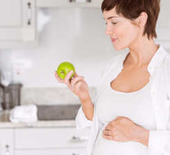 Pregnant woman eating healthy