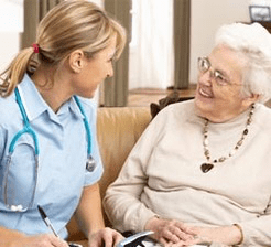 Senior woman consulting healthcare professional